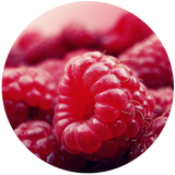 Close-up image of fresh raspberries, showing the texture and color of the fruit.